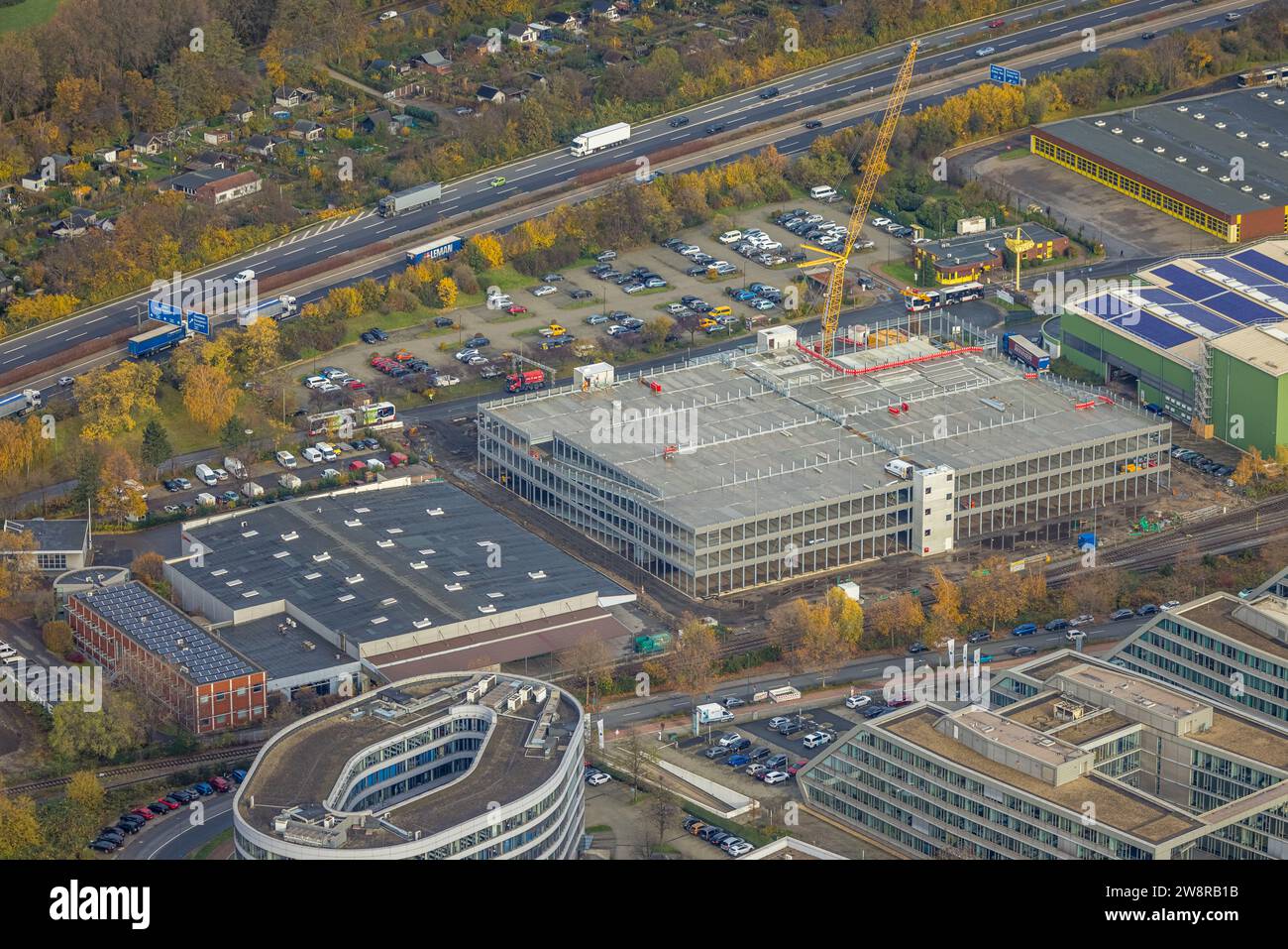 Aerial view, commercial area with construction site and new building ...