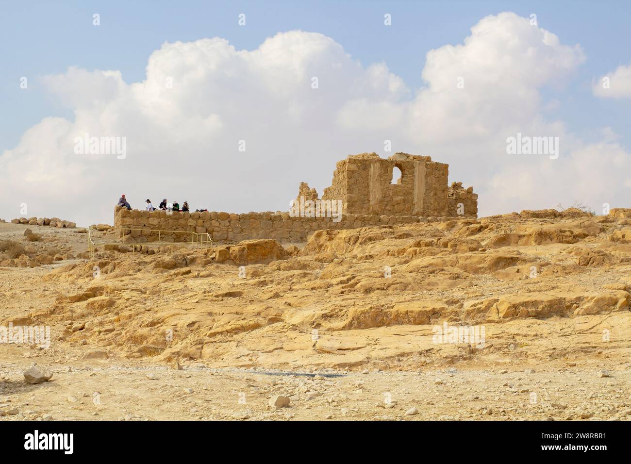 November 2022, Tourists visit the ancient ruins at Massada, built by Herod the Great, and the ancient site of Jewish revolt against the Roman occupati Stock Photo