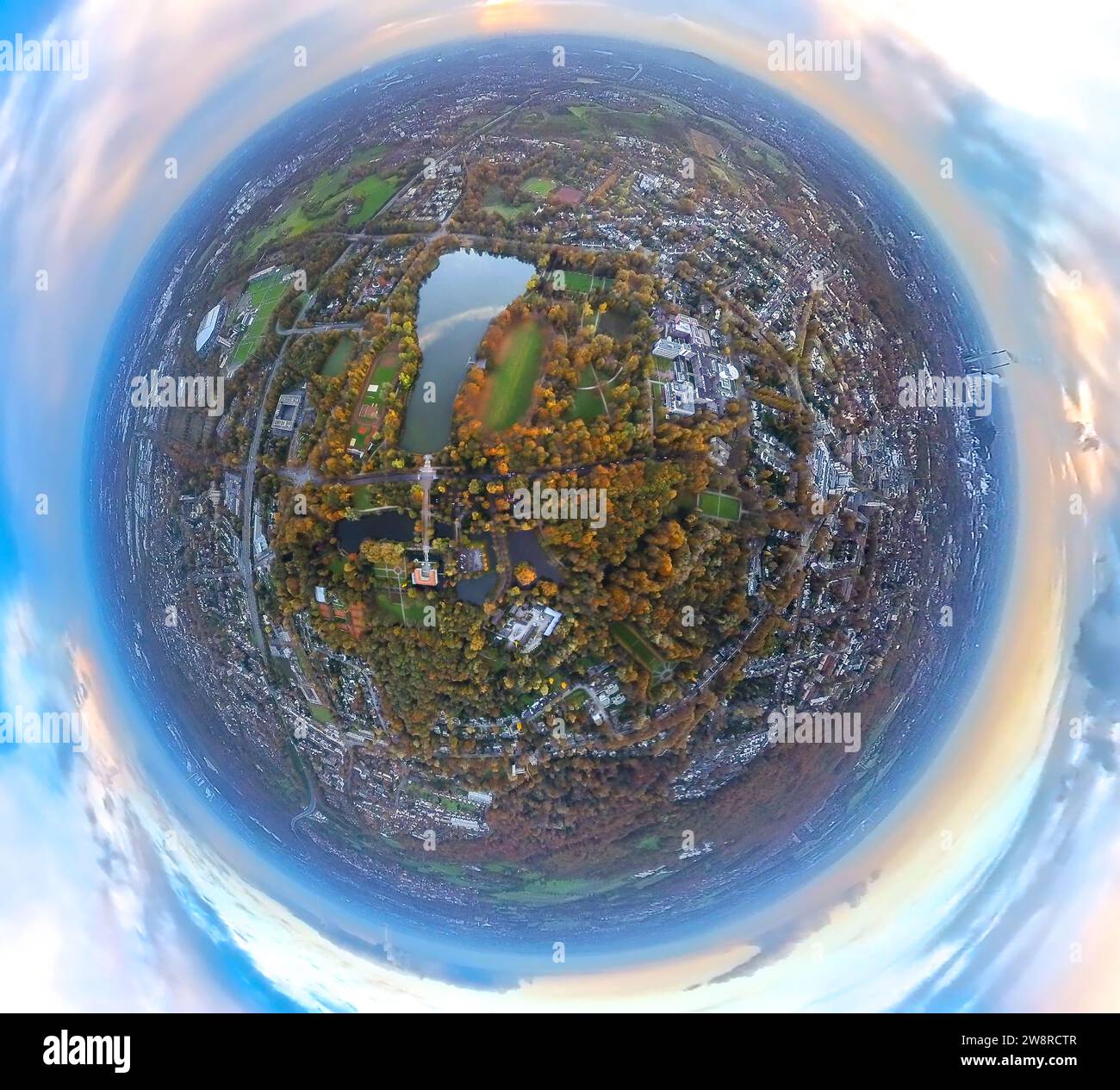 Aerial view, Berge Castle with park and Berger Lake, autumn forest with