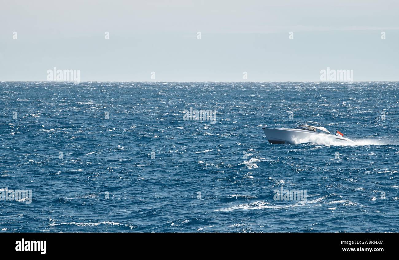 A motorboat is sailing at high speed in the sea near Monaco Stock Photo ...