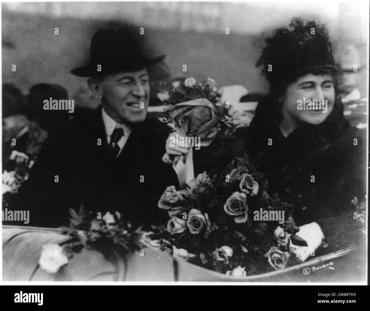 Woodrow Wilson, half length, seated, facing right; and his wife (Edith ...