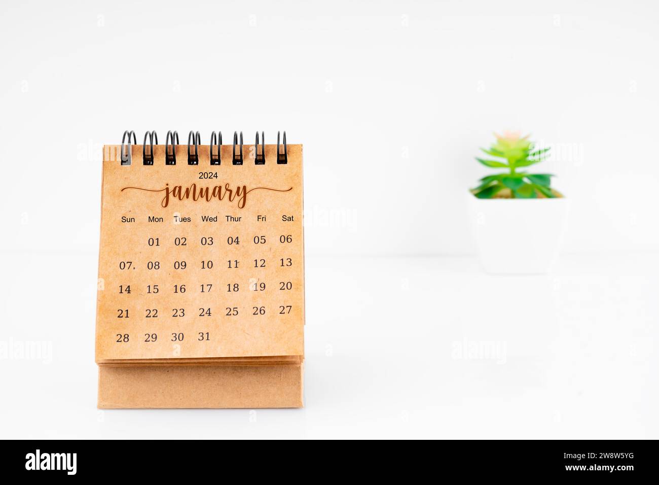 January 2024 Monthly desk calendar for 2024 year with plant pot on ...