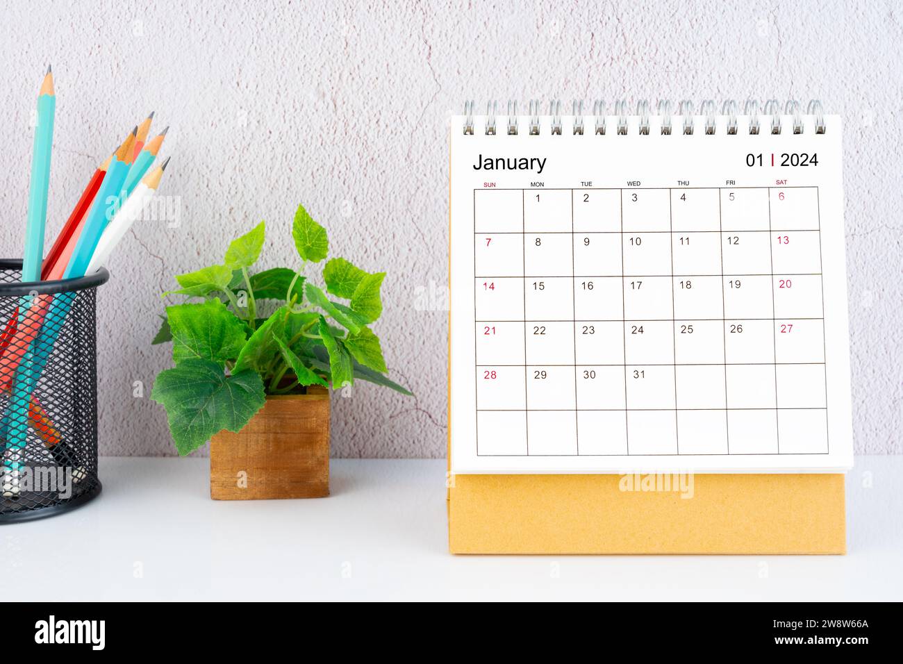 January 2024 Desk Calendar with pencil on white table Stock Photo - Alamy