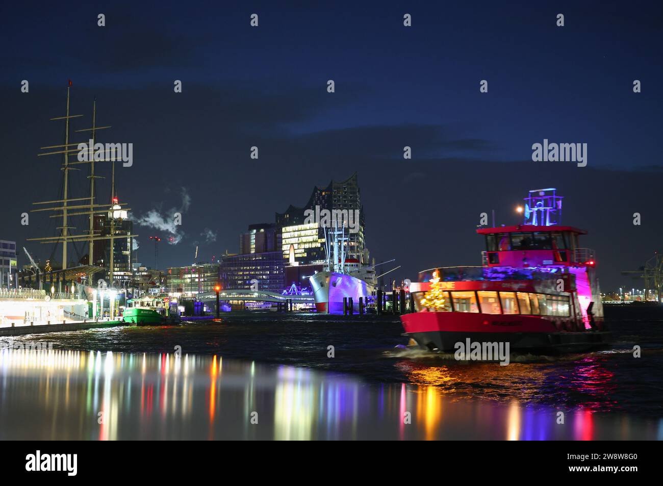 Hamburg, Germany. 22nd Dec, 2023. An HVV harbor ferry docks at the ...