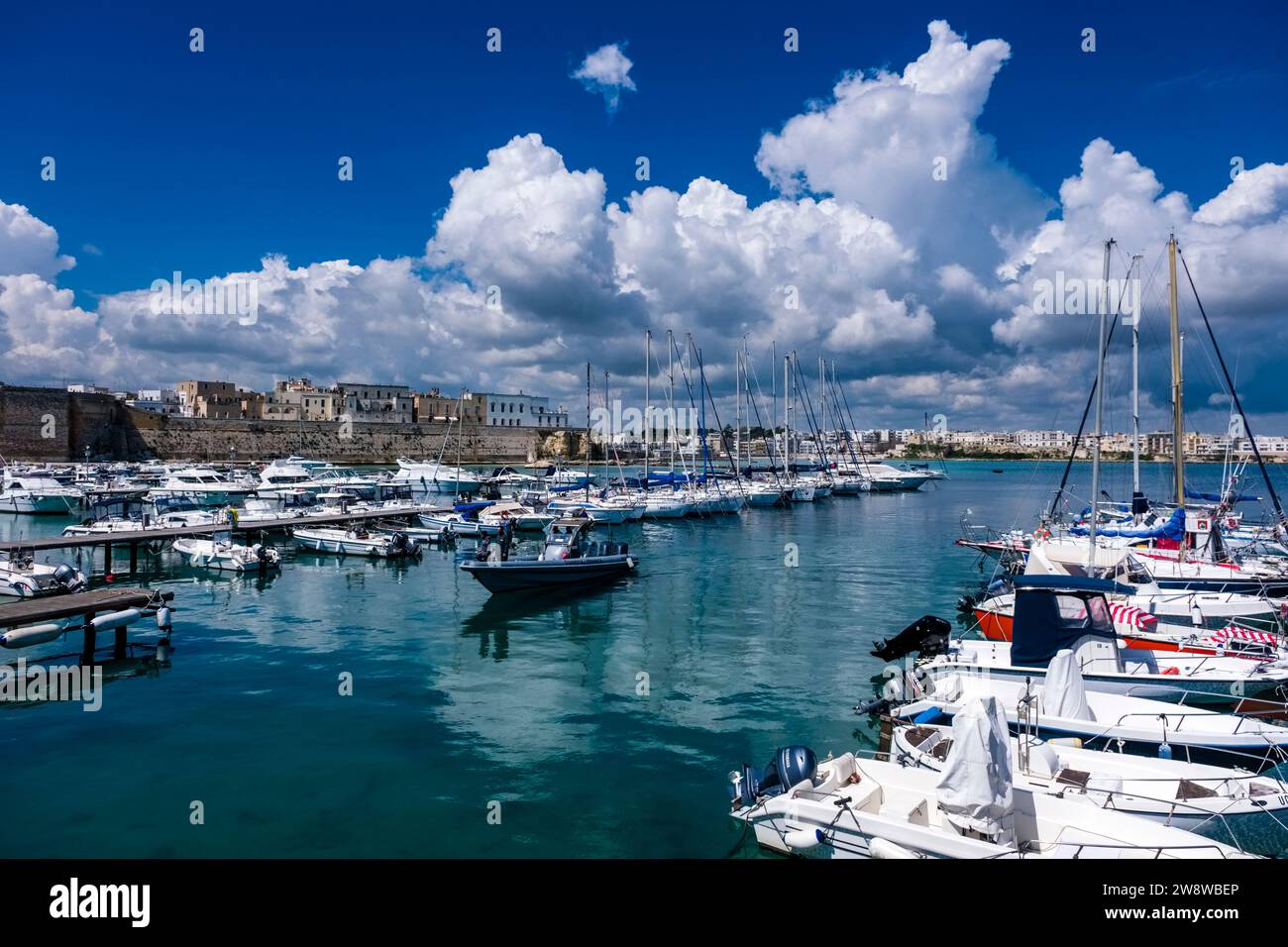 Marina of Ortranto with many sailing and motor boats anchoring. Stock Photo