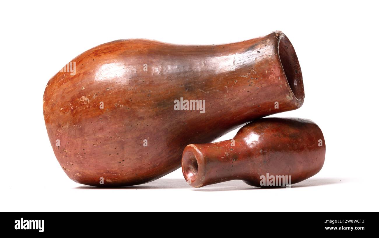 Old brown pottery, isolated on a white background Stock Photo - Alamy