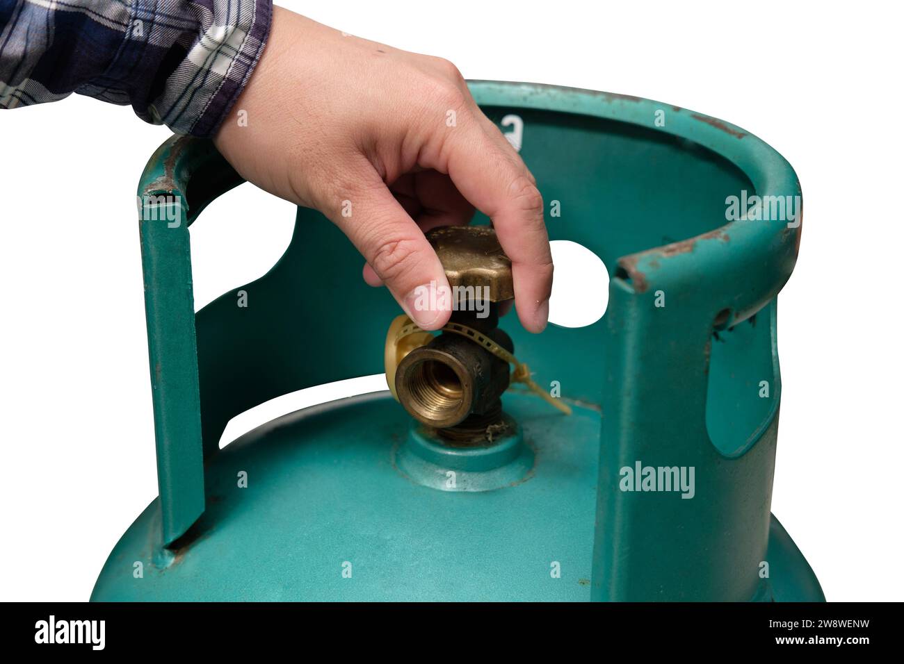 Male hand is closing the valve of lpg gas tank for safety. Files can