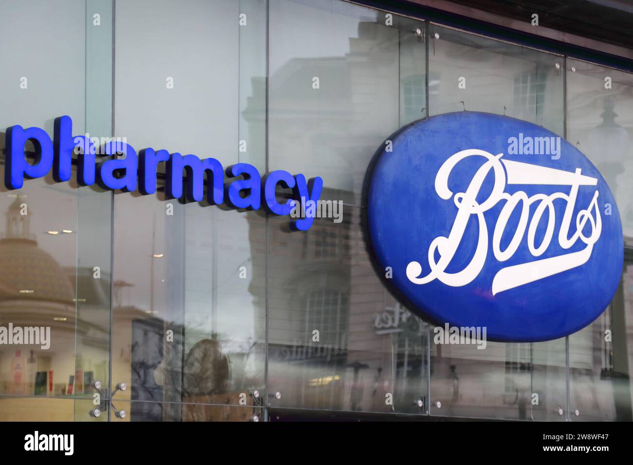 Logo above the Boots outlet at Piccadilly Circus, London, UK Stock