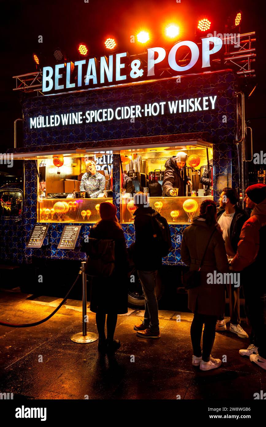 People Buying Mulled Wine and Spiced Cider etc from A Shop/Stall At The Southbank Centre Winter Market, London, Uk Stock Photo