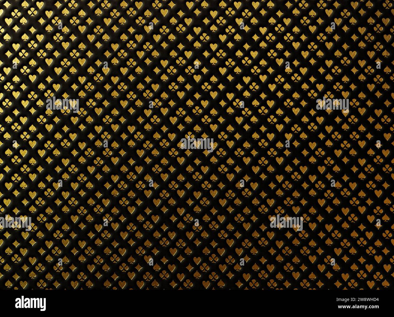 A black leather surface embossed with an array of gold casino card heart, diamond, spade, and club - 3D render Stock Photo