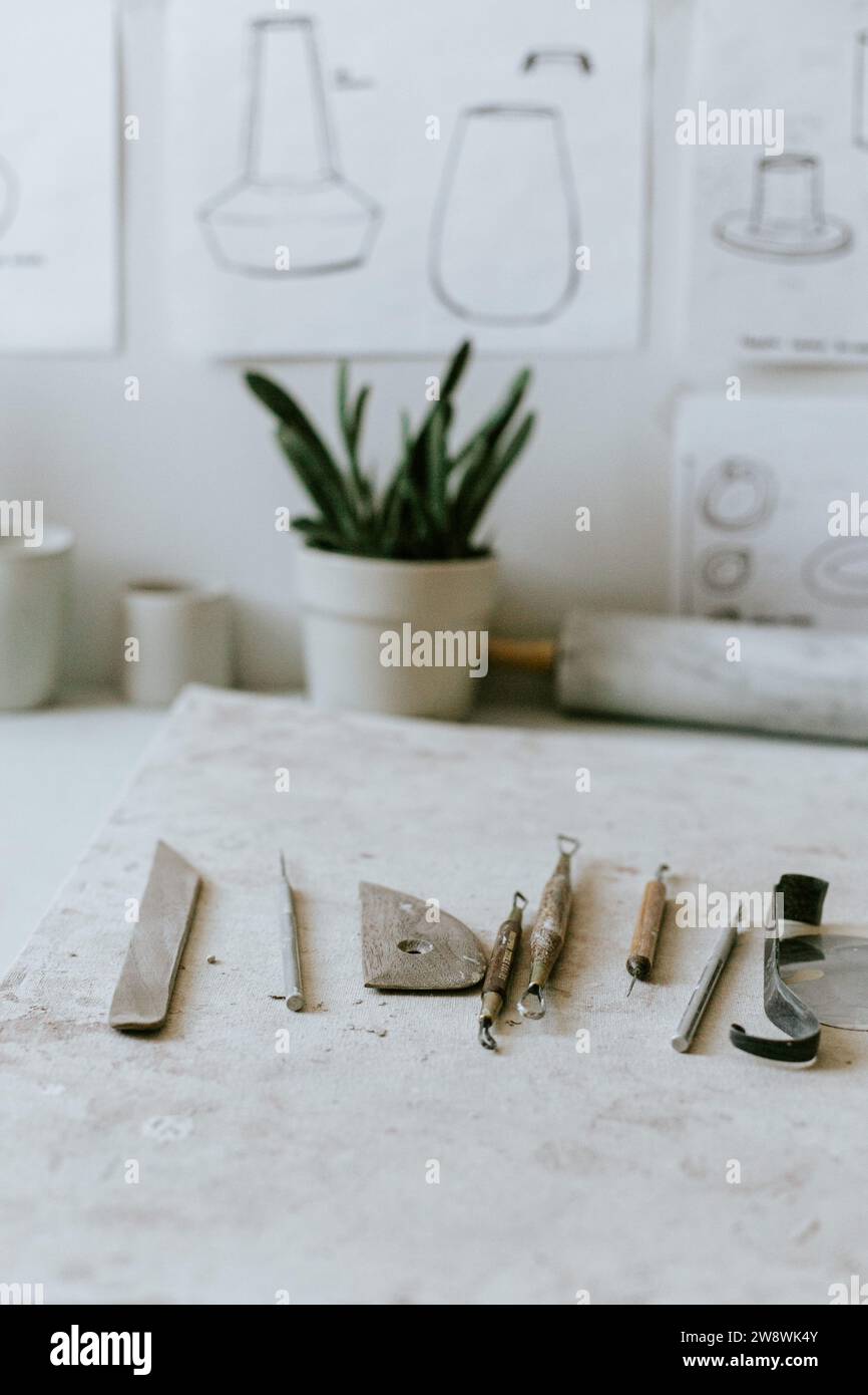 Pottery Making shaping tools on table Stock Photo Alamy