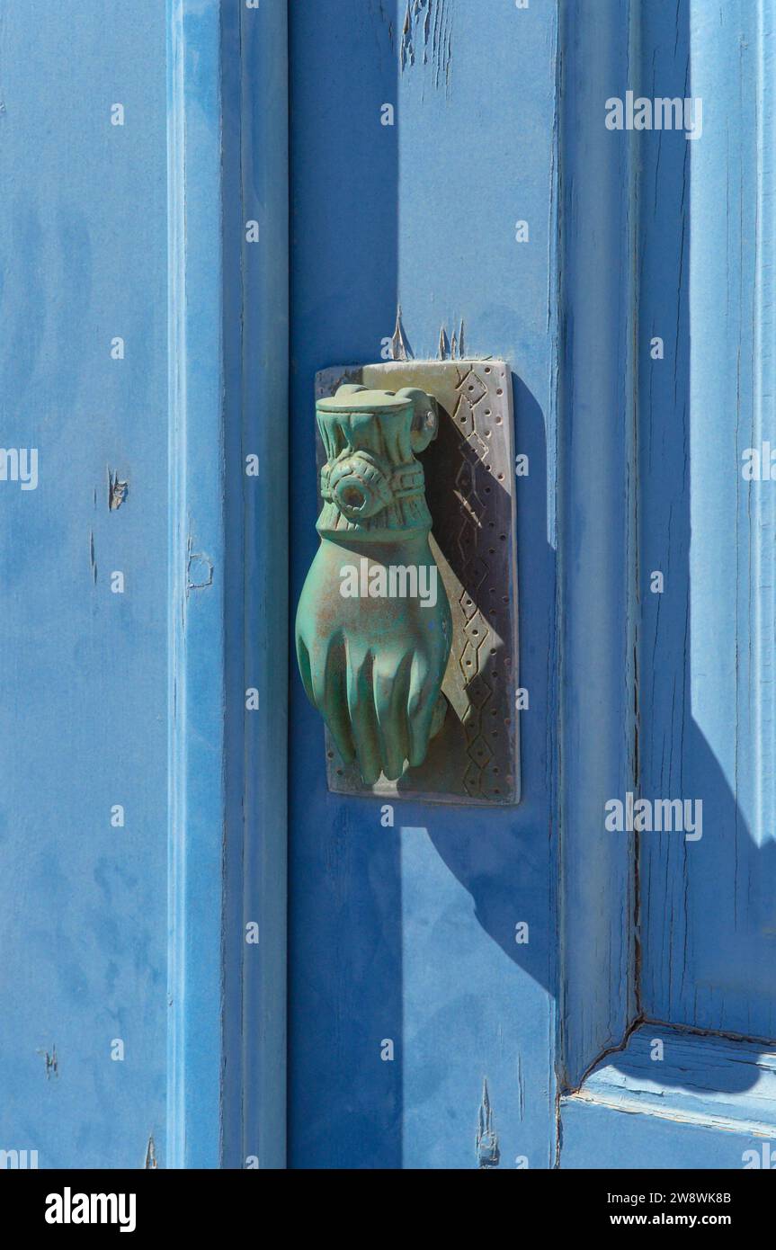 Old door handle in a typical painted blue on Santorini Stock Photo Alamy