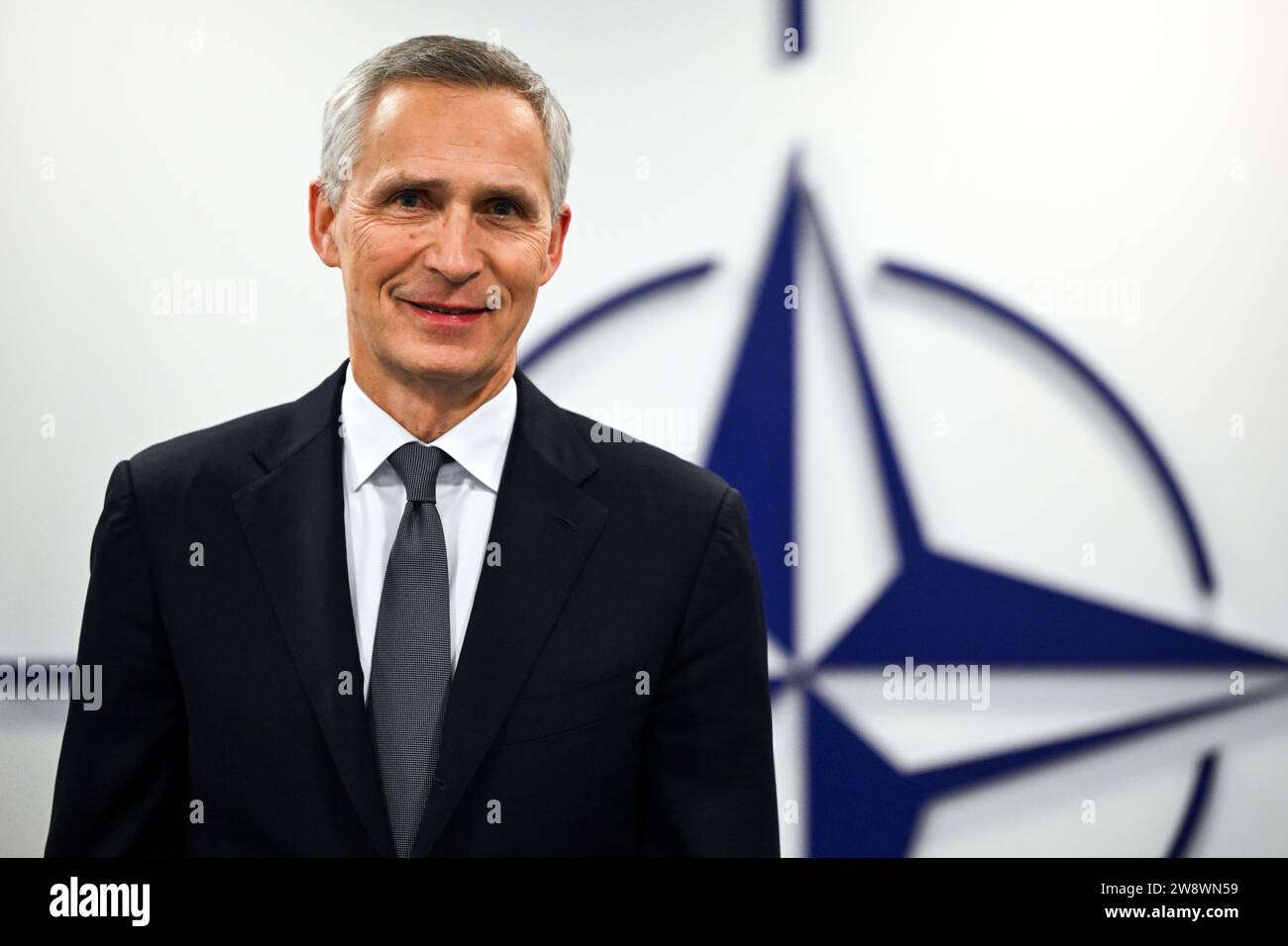 FILED - 07 December 2023, Belgium, Brüssel: Jens Stoltenberg, NATO Secretary General, answers questions at NATO headquarters during an interview with the German Press Agency. (to dpa: 'NATO Secretary General considers Putin's war goal no longer achievable') Photo: Federico Gambarini/dpa Stock Photo