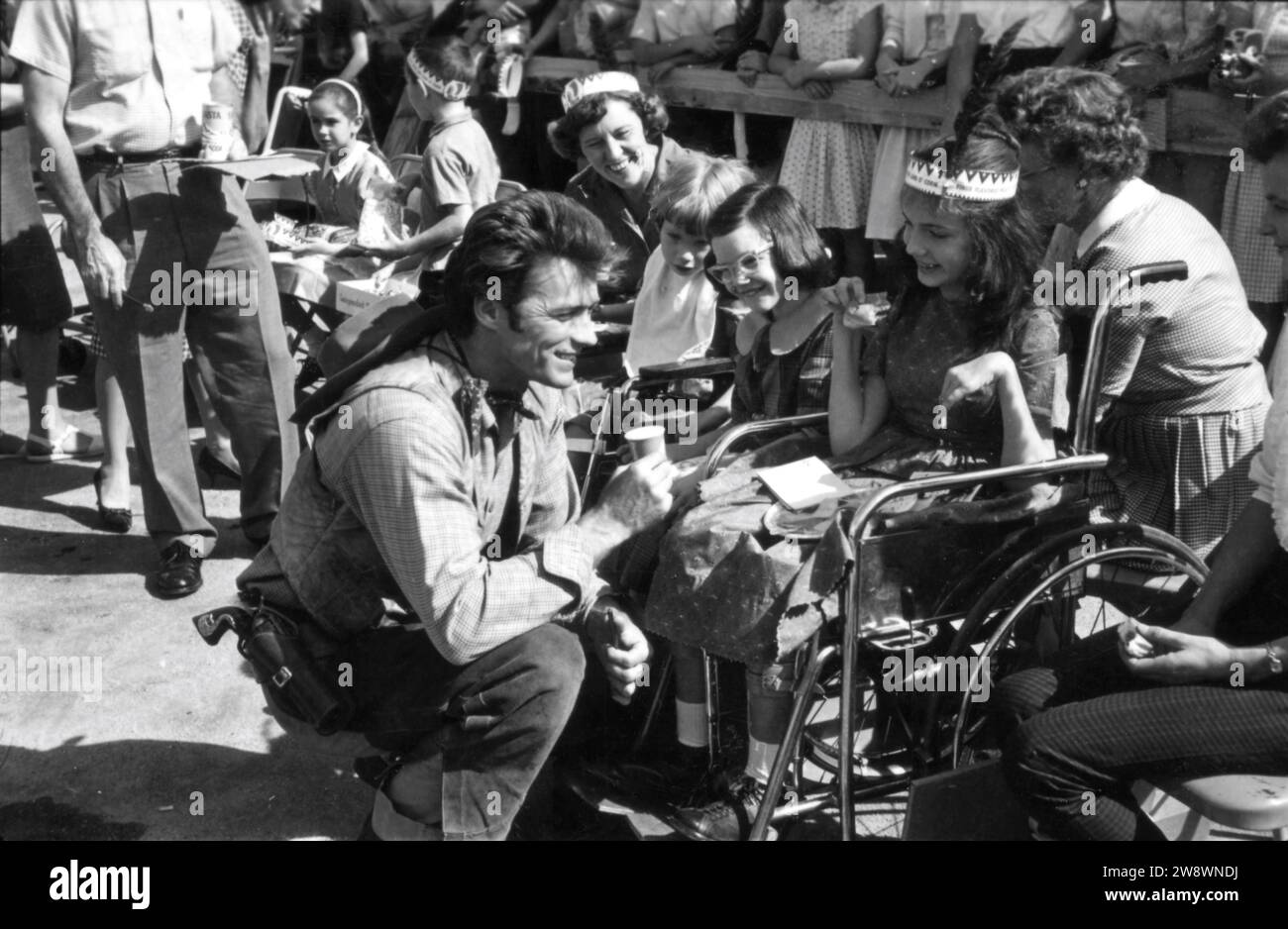 CLINT EASTWOOD circa 1963 candid at the time he was appearing in the TV series RAWHIDE at a cowboy / western show for disabled children Stock Photo