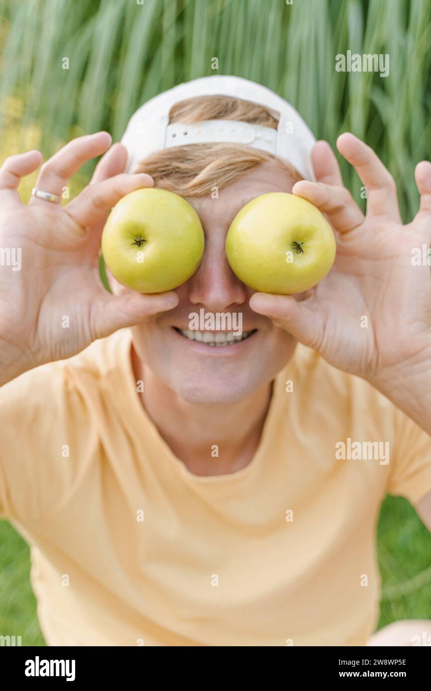 The guy has apples for eyes Stock Photo Alamy