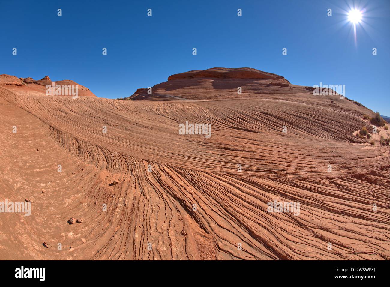 Wavy sandstone hill at Ferry Swale near Page AZ Stock Photo