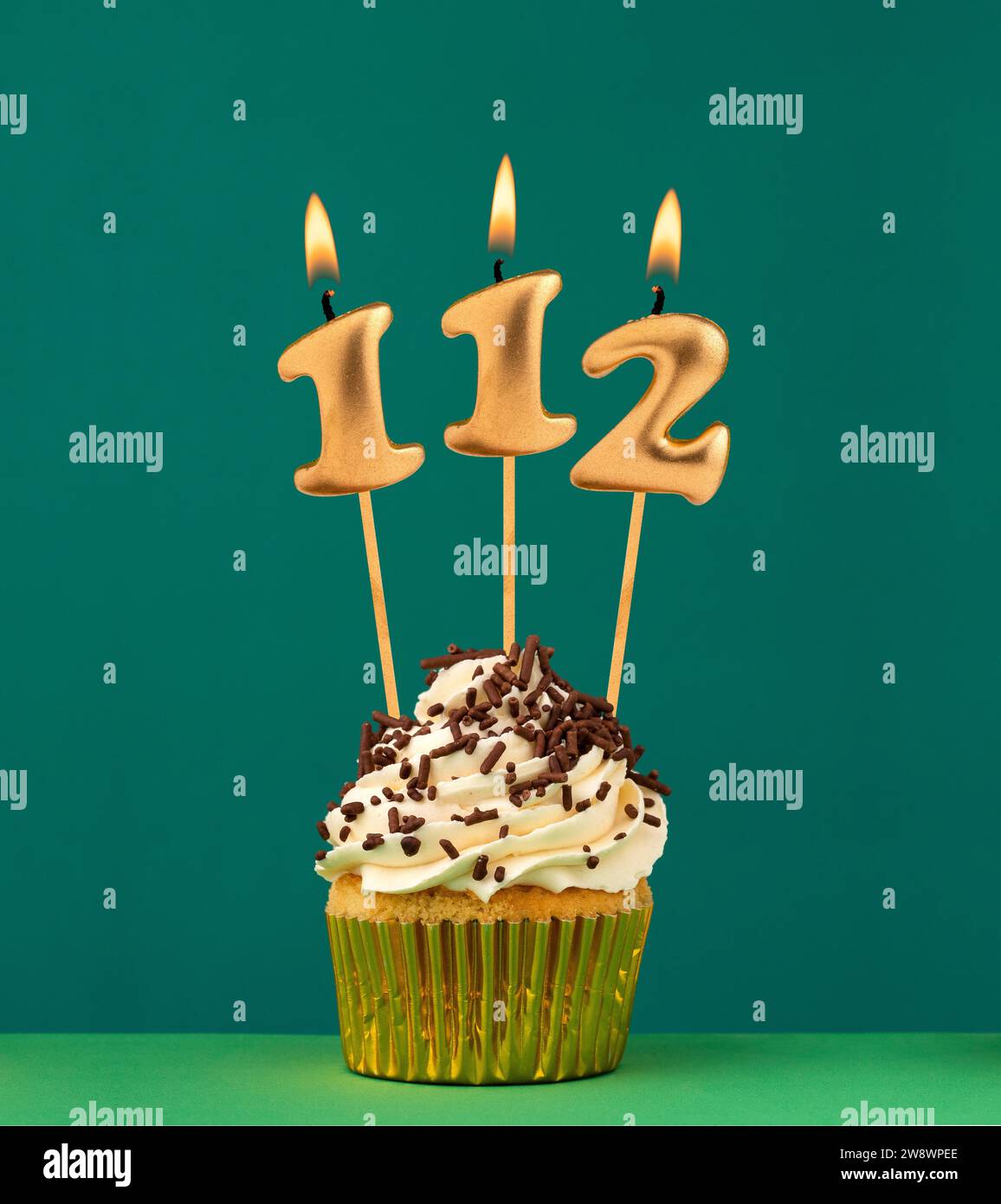 Birthday card with candle number 112 - Green background Stock Photo - Alamy