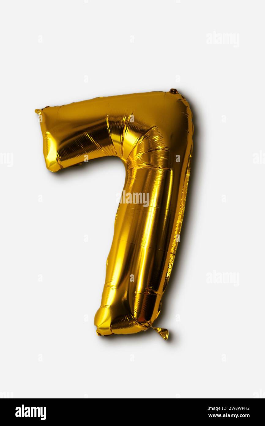 Foil balloon number seven isolated on white background. Stock Photo