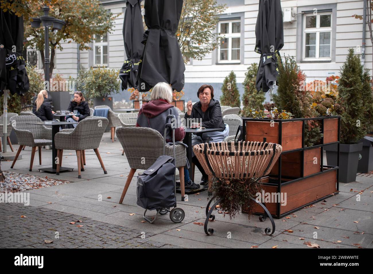 Belgrade, Serbia, Nov 10, 2023: View of an outdoors cafe with guests in Zemun Stock Photo