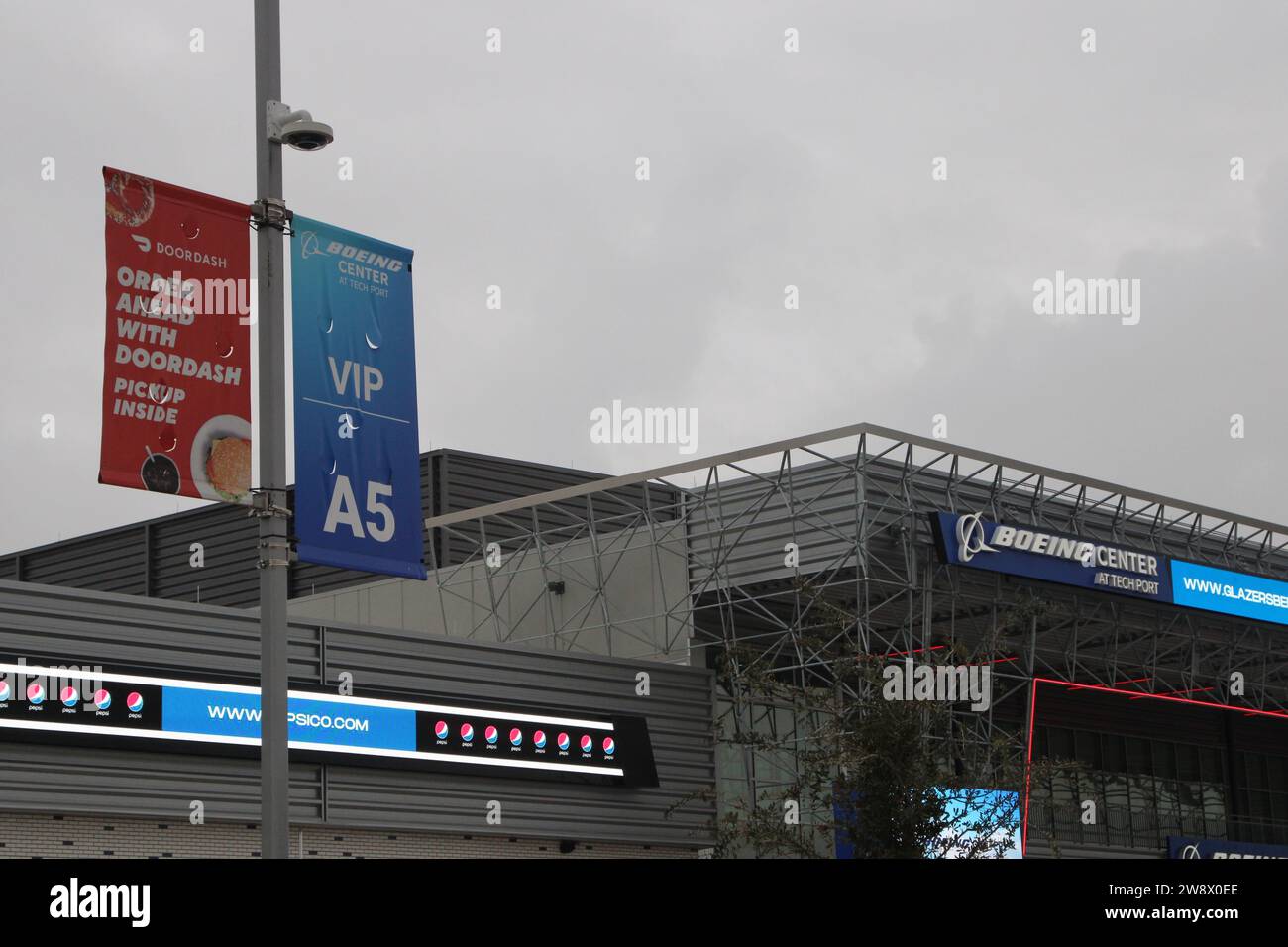 San Antonio, USA. 21st Dec, 2023. A DoorDash banner outside of the Boeing Center at Tech Port in San Antonio, Texas, USA, on December 21, 2023. The entertainment venue first opened in 2022 and has since brought big name acts to the southwest side of San Antonio. In early 2023, Boeing paid a seven-year naming rights fee to the venue for an undisclosed amount of money. In 2024, Boeing Center will host punk rock bands Bad Religion and Social Distortion with special guest Lovebombs. (Photo by Carlos Kosienski/Sipa USA) Credit: Sipa USA/Alamy Live News Stock Photo