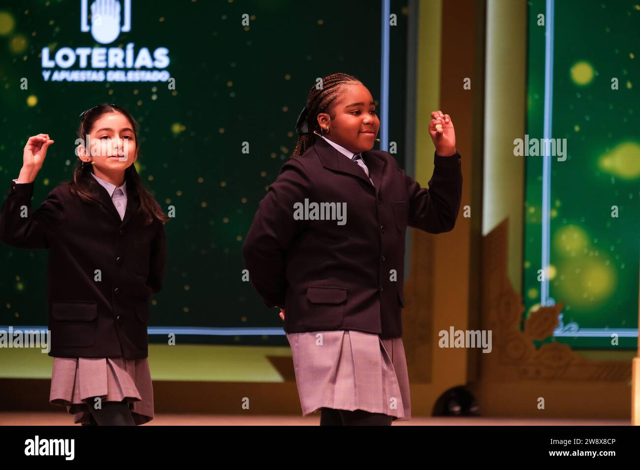 The children of San Ildefonso sing the lottery balls with the numbers of the Extraordinary Draw of the Christmas Lottery, called 'El Gordo', at the Teatro Real on December 22, 2023 in Madrid, Spain. (Photo by Oscar Gonzalez/Sipa USA) (Photo by Oscar Gonzalez/Sipa USA) Stock Photo