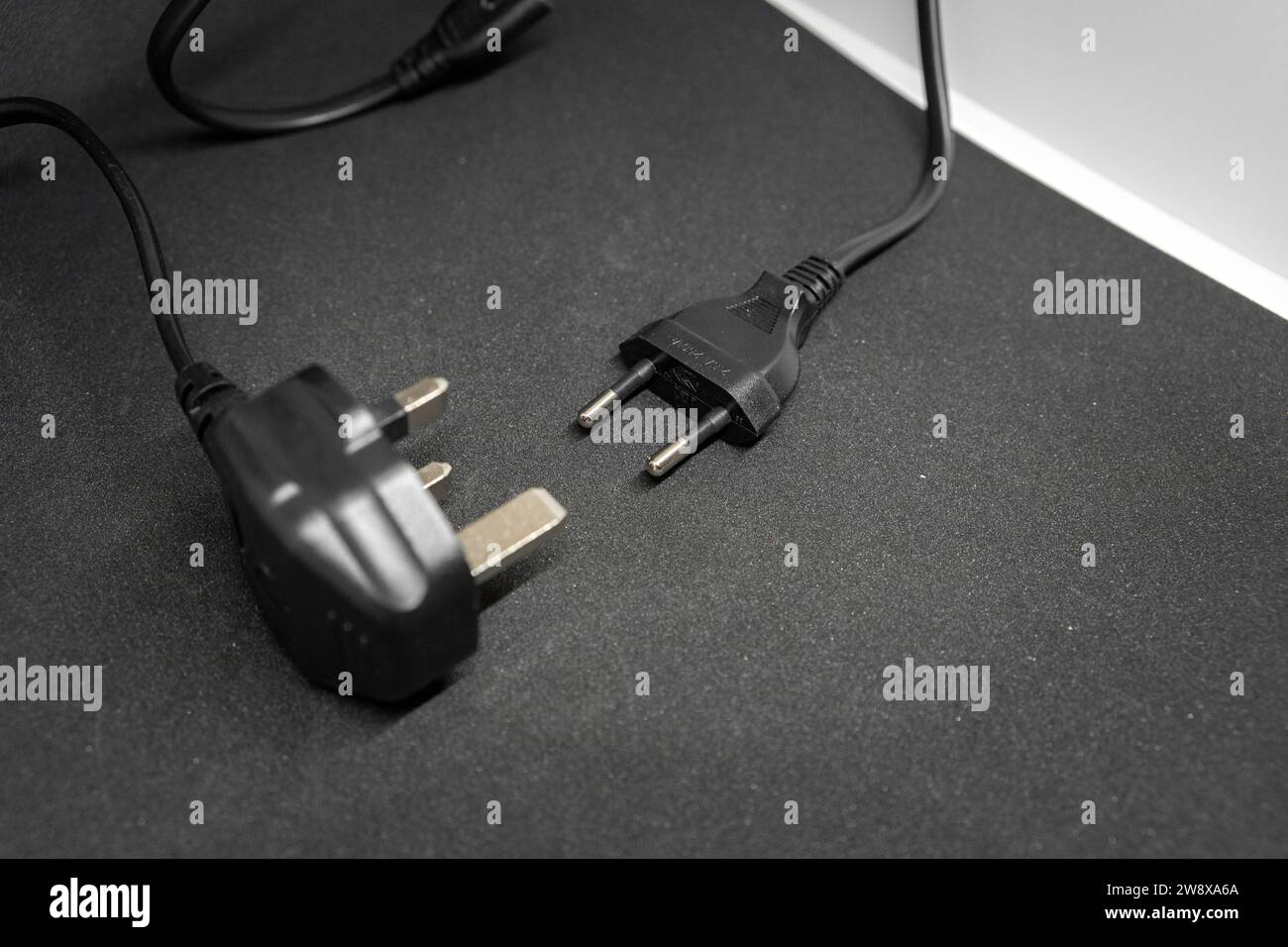 European power plug next to American Stock Photo Alamy