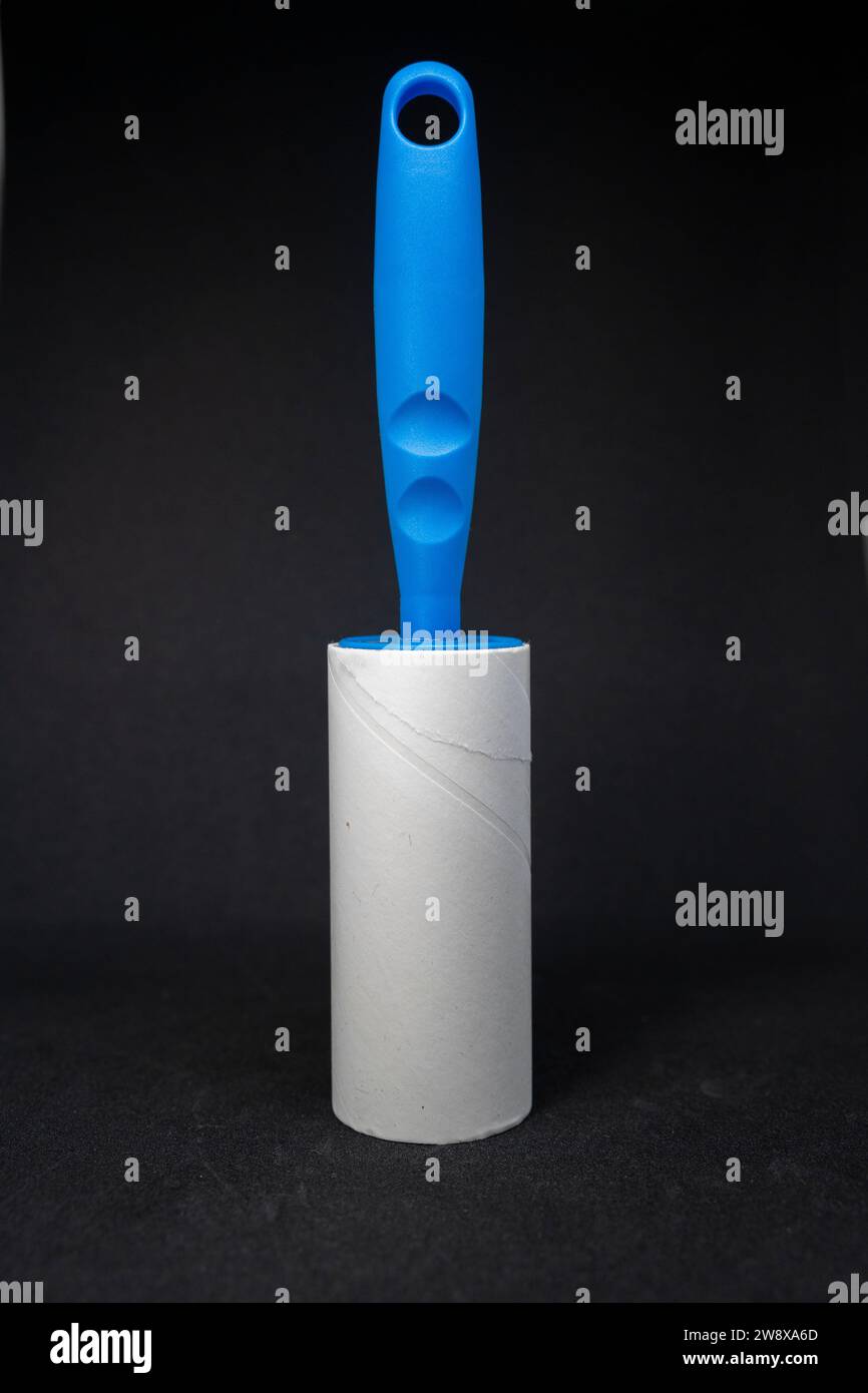 Sticky roller lint remover for clothes Stock Photo