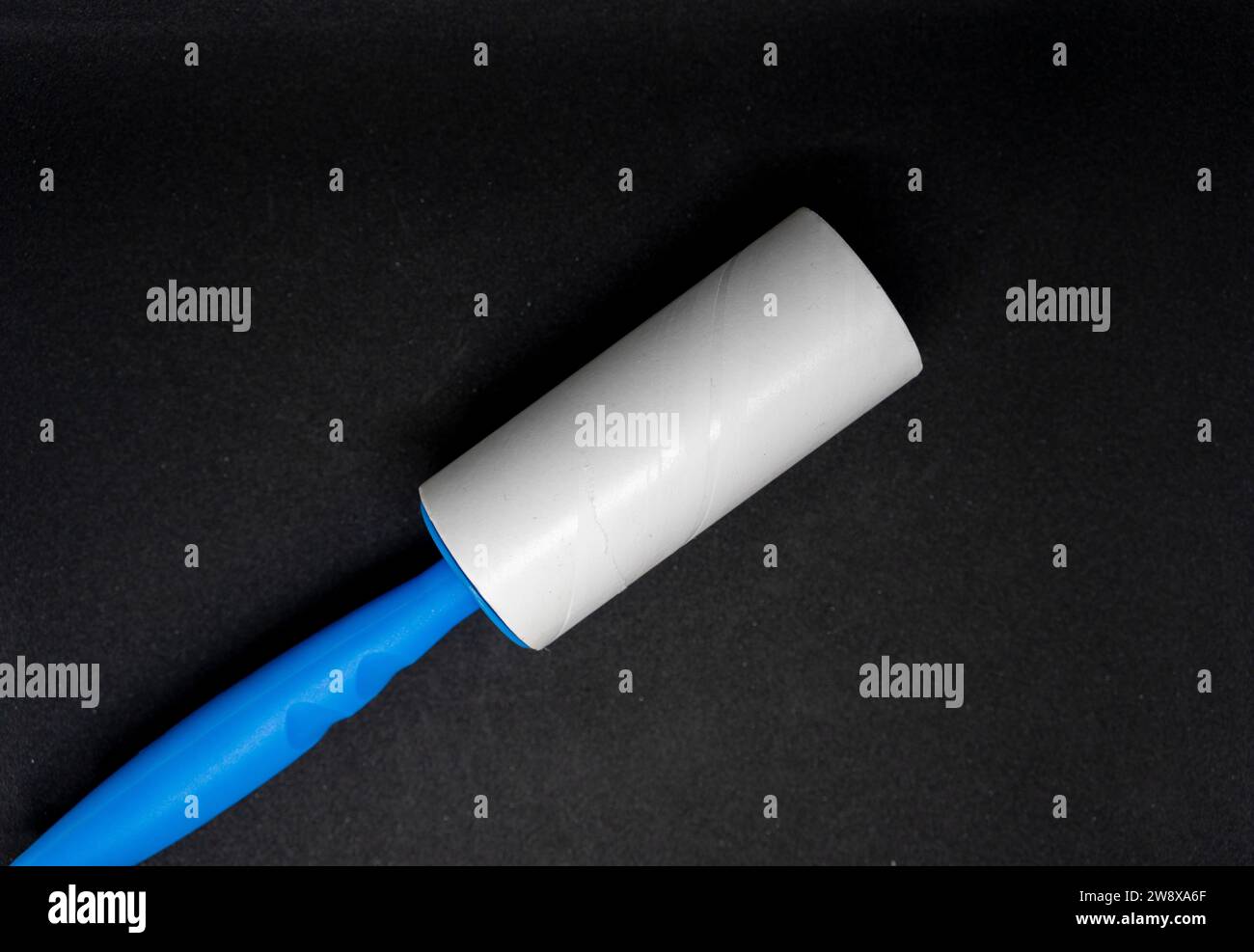 Sticky roller lint remover for clothes Stock Photo