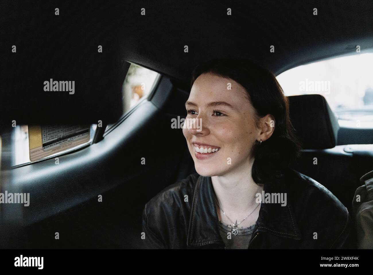 Woman in front seat of car hi-res stock photography and images - Alamy