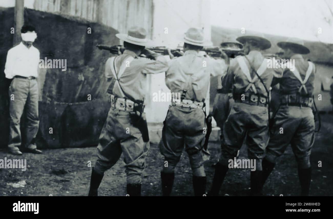 Batista firesquad 1956. Soldiers for the Cuban dictator Fulgencio Batista executed a revolutionary by firing squad in 1956 during the early stages of the Cuban Revolution.(original caption) Stock Photo