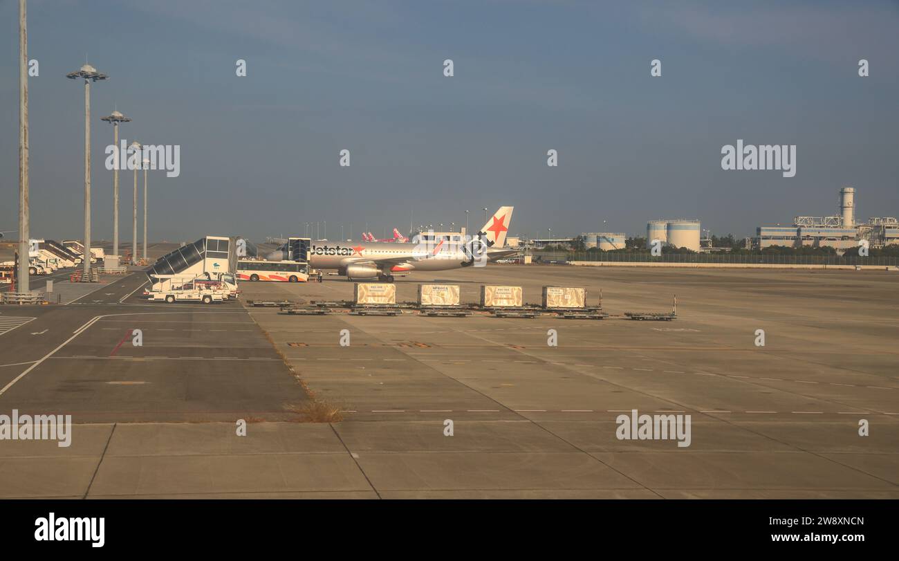 Ground Handling services equipments, container and pallet transporter wait for operate at KANSAI International Airport. Stock Photo