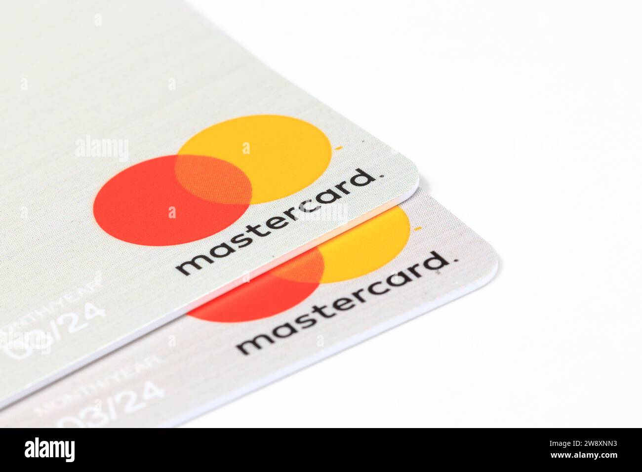 Credit cards with part of logo on corner of card isolated on white background. Stock Photo