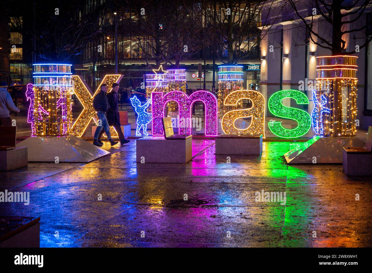 Warsaw, Poland. 22nd Dec, 2023. Colorful, illuminated Christmas lighting sculptures are seen in Warsaw, Poland on 22 December, 2023. Objects and designs from the time of the Polish People's Republic (PRL) have been chose as this year's theme for Christmas lighting decoratoins in the city. (Photo by Jaap Arriens/Sipa USA) Credit: Sipa USA/Alamy Live News Stock Photo