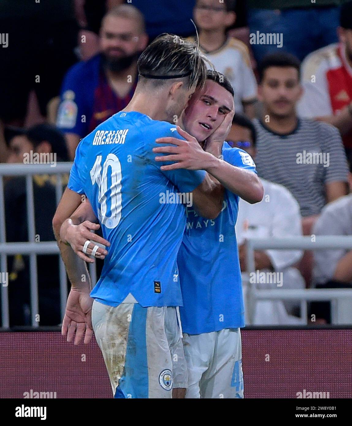 Manchester City's Phil Foden celebrates scoring their side's third goal of the game with Jack Grealish during the FIFA Club World Cup 2023 final at the King Abdullah Sports City Stadium, Jeddah, Saudi Arabia. Picture date: Friday December 22, 2023. Stock Photo