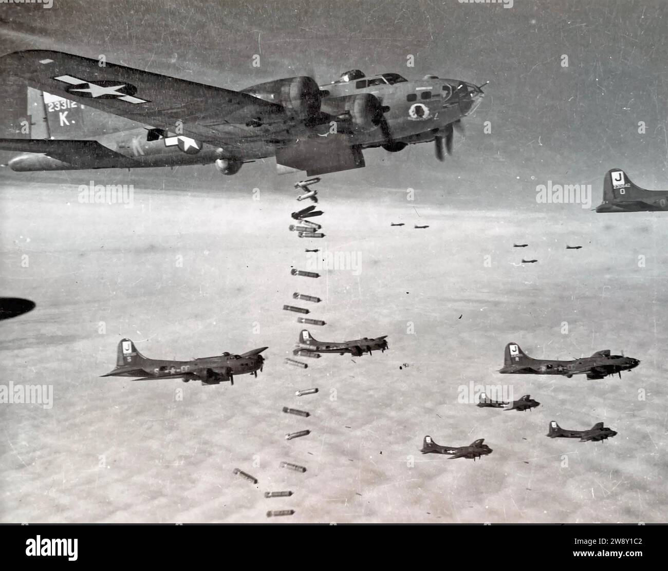BOEING B-17 FLYING FORTRESSES of the USAF bombing through cloud  over Germany on a signal from the formation leader who used radar to find the target, Stock Photo