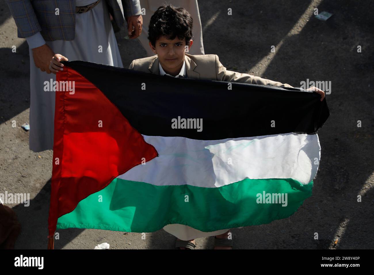 Sanaa, Sanaa, Yemen. 22nd Dec, 2023. A Boy Holds Palestinian Flag 