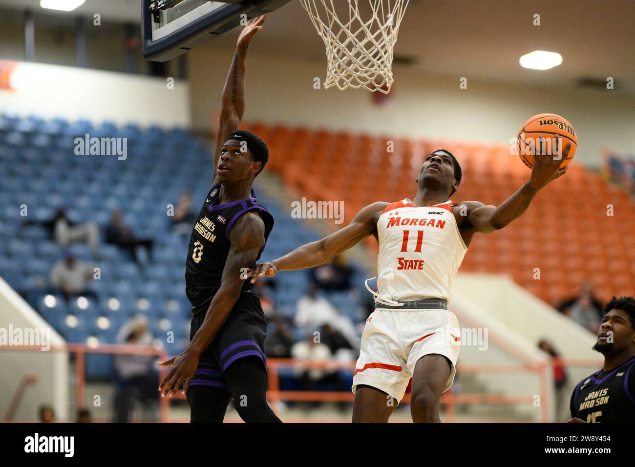 State guard Amahrie Simpkins (11) goes to the basket against