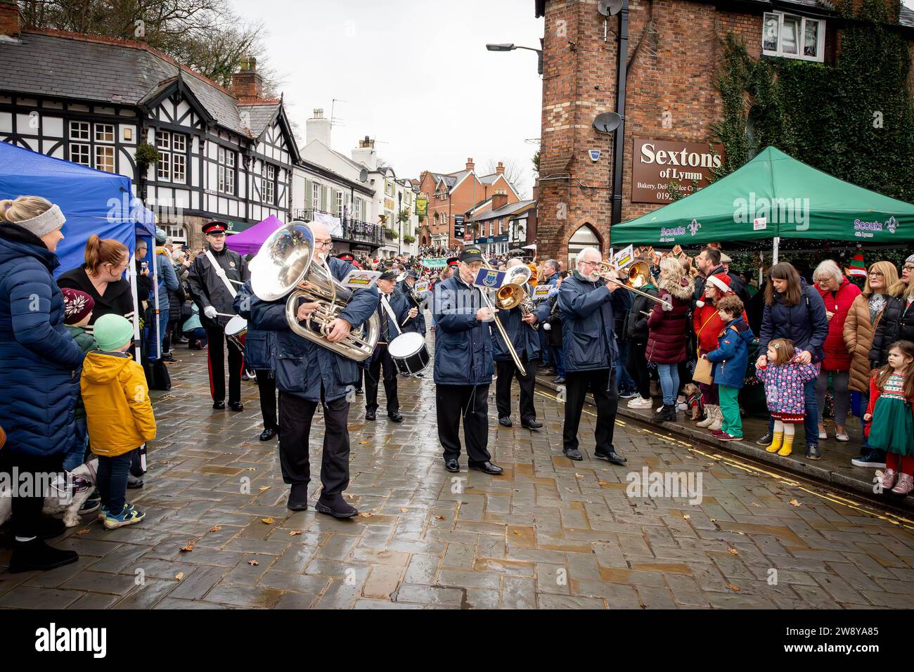 Lymm Dickensian Day 2023. People dressed in Dickensian costume; stalls in the streets; street entertainment; Grand Parade Stock Photo