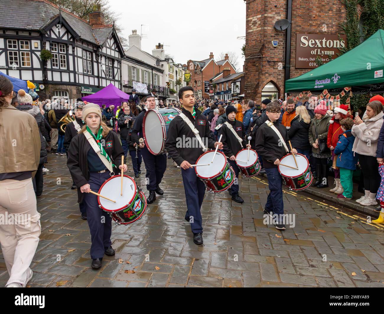 Lymm Dickensian Day 2023. People dressed in Dickensian costume; stalls in the streets; street entertainment; Grand Parade Stock Photo