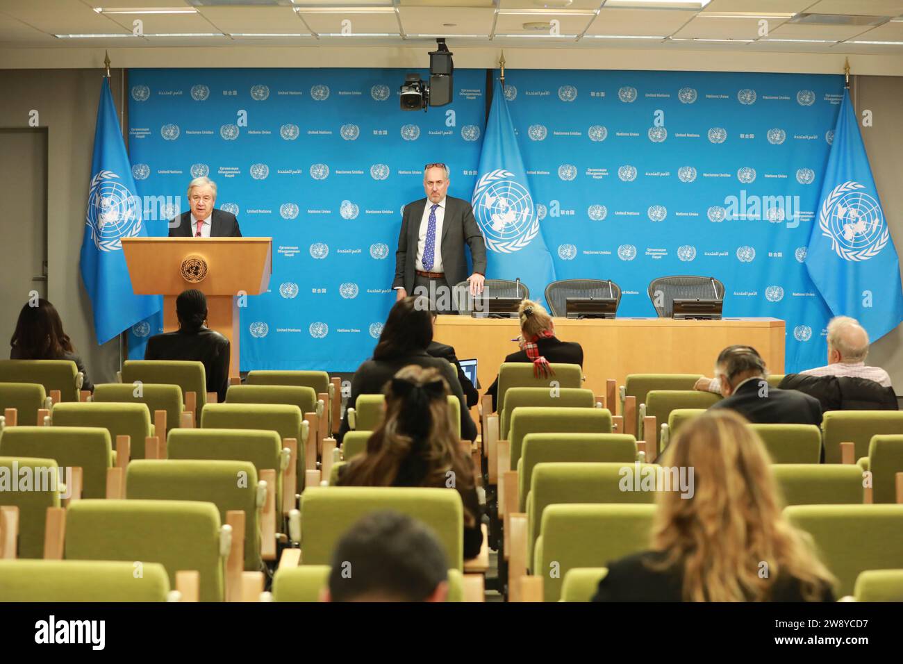United Nations, UN headquarters in New York. 22nd Dec, 2023. UN Secretary-General Antonio Guterres (L, rear) speaks to reporters at the UN headquarters in New York, on Dec. 22, 2023. Guterres said Friday that the Israeli offensive is creating massive obstacles to the distribution of humanitarian aid inside Gaza. Credit: Xie E/Xinhua/Alamy Live News Stock Photo