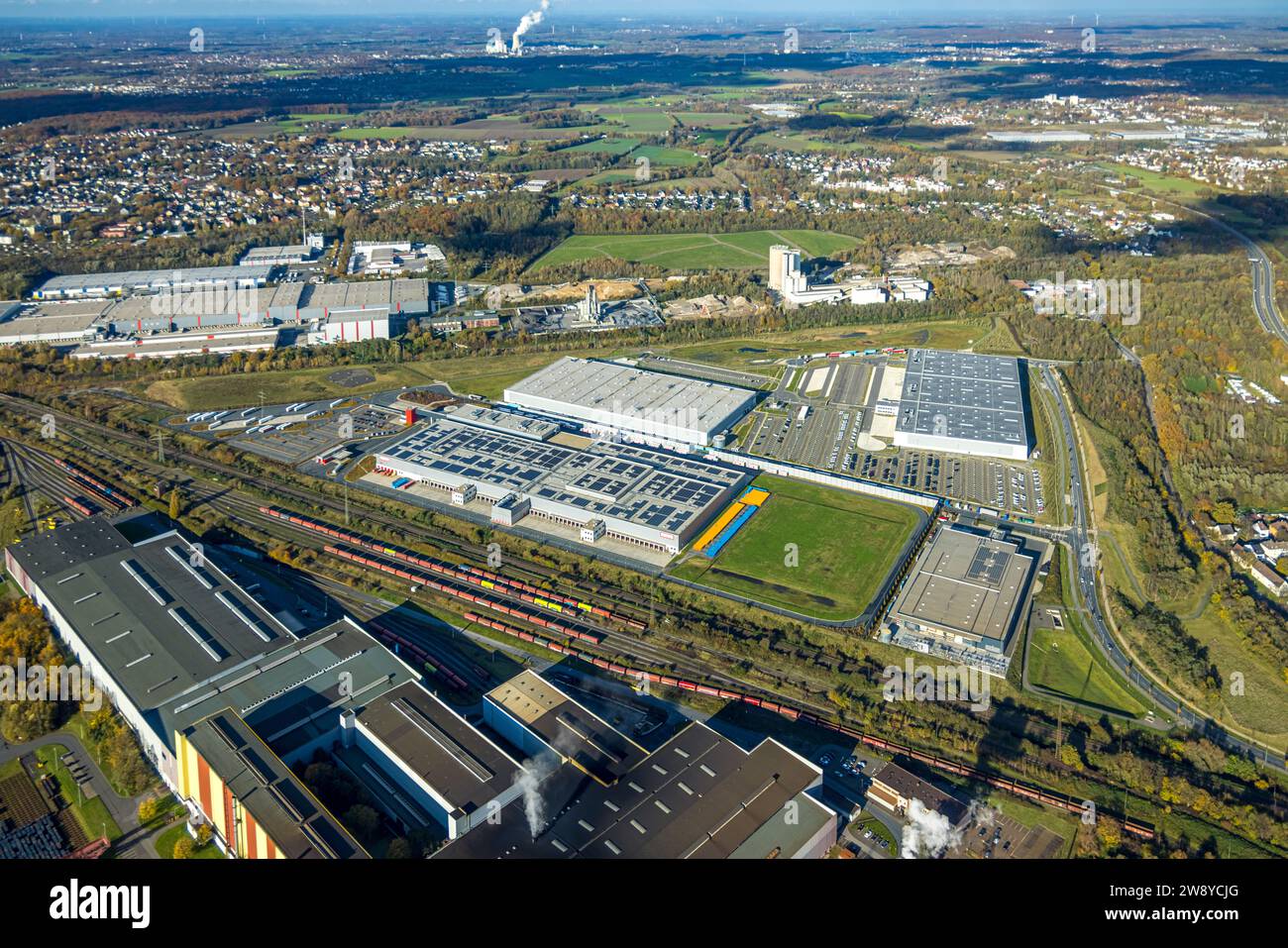 Aerial view, development of the Westfalenhütte sinter plant industrial estate with Bergisch-Westerwälder Hartsteinwerke and the logistics companies Re Stock Photo