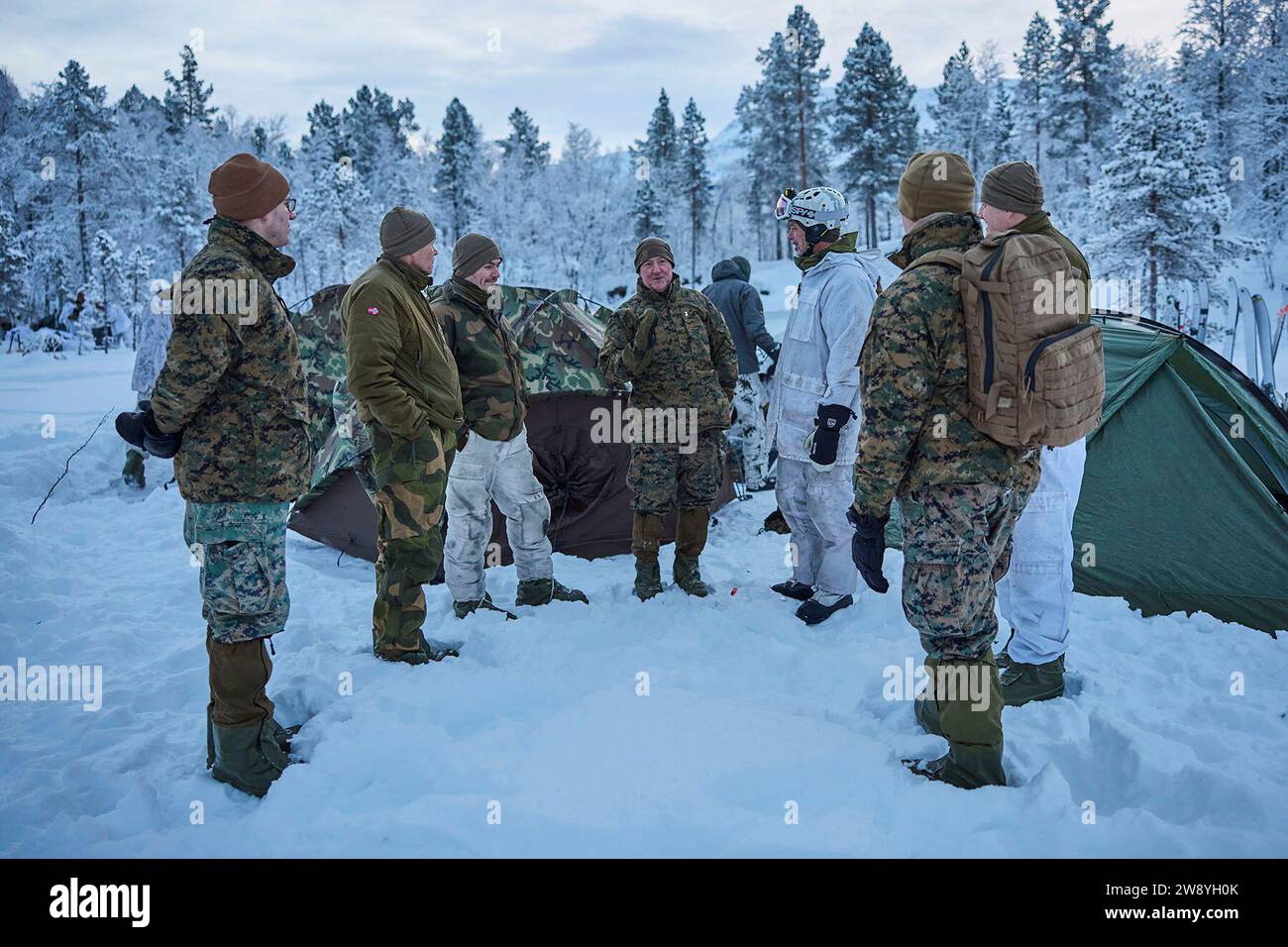 Setermoen, Norway. 8th Dec, 2023. December 8, 2023 - Setermoen, Norway - U.S. Marine Corps Maj. Gen. Robert B. Sofge Jr., commander of U.S. Marine Corps Forces Europe and Africa, speaks with Norwegian Soldiers and U.S. Marines, in Setermoen, Norway on December. 8, 2023. Sofge visited the Marines participating in the NATO Winter Instructor Course. The NWIC trains Marines and other service members as instructors for cold weather survival in preparation for upcoming deployments. This strategic engagement not only amplifies the significance of Sofge's direct involvement with the Marines but f Stock Photo