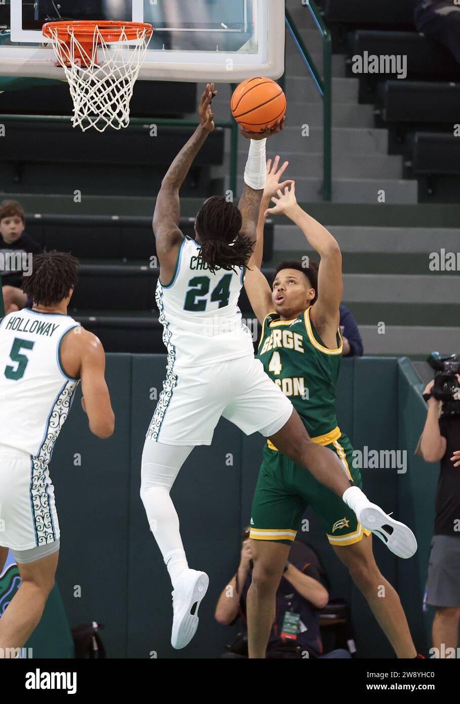 New Orleans, USA. 22nd Dec, 2023. Tulane Green Wave forward Kevin Cross (24) shoots a layup against George Mason Patriots guard Keyshawn Hall (4) during a men's basketball game at Fogleman Arena in New Orleans, Louisiana on Friday, December 22, 2023. (Photo by Peter G. Forest/Sipa USA) Credit: Sipa USA/Alamy Live News Stock Photo