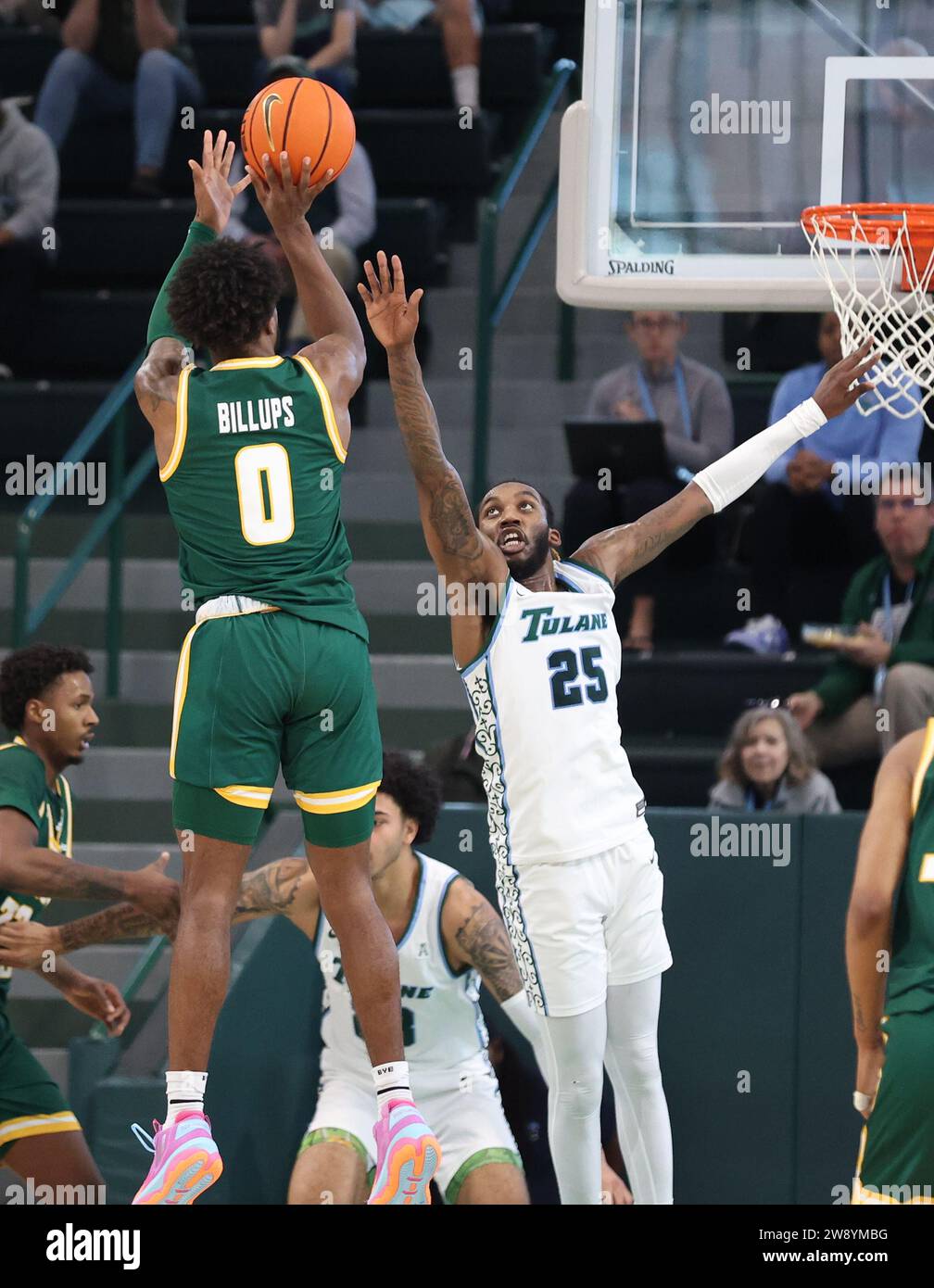 New Orleans, USA. 22nd Dec, 2023. George Mason Patriots guard Jared Billups (0) shoots a three-pointer over Tulane Green Wave guard Jaylen Forbes (25) during a men's basketball game at Fogleman Arena in New Orleans, Louisiana on Friday, December 22, 2023. (Photo by Peter G. Forest/Sipa USA) Credit: Sipa USA/Alamy Live News Stock Photo