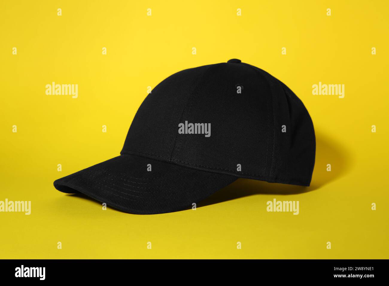 Yellow and black baseball cap hi-res stock photography and images - Alamy