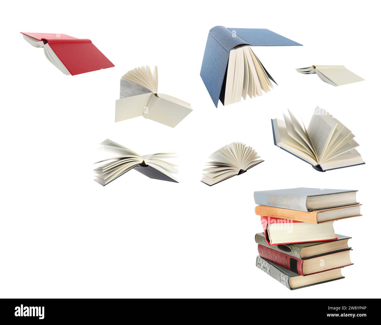Books flying over stack on white background Stock Photo