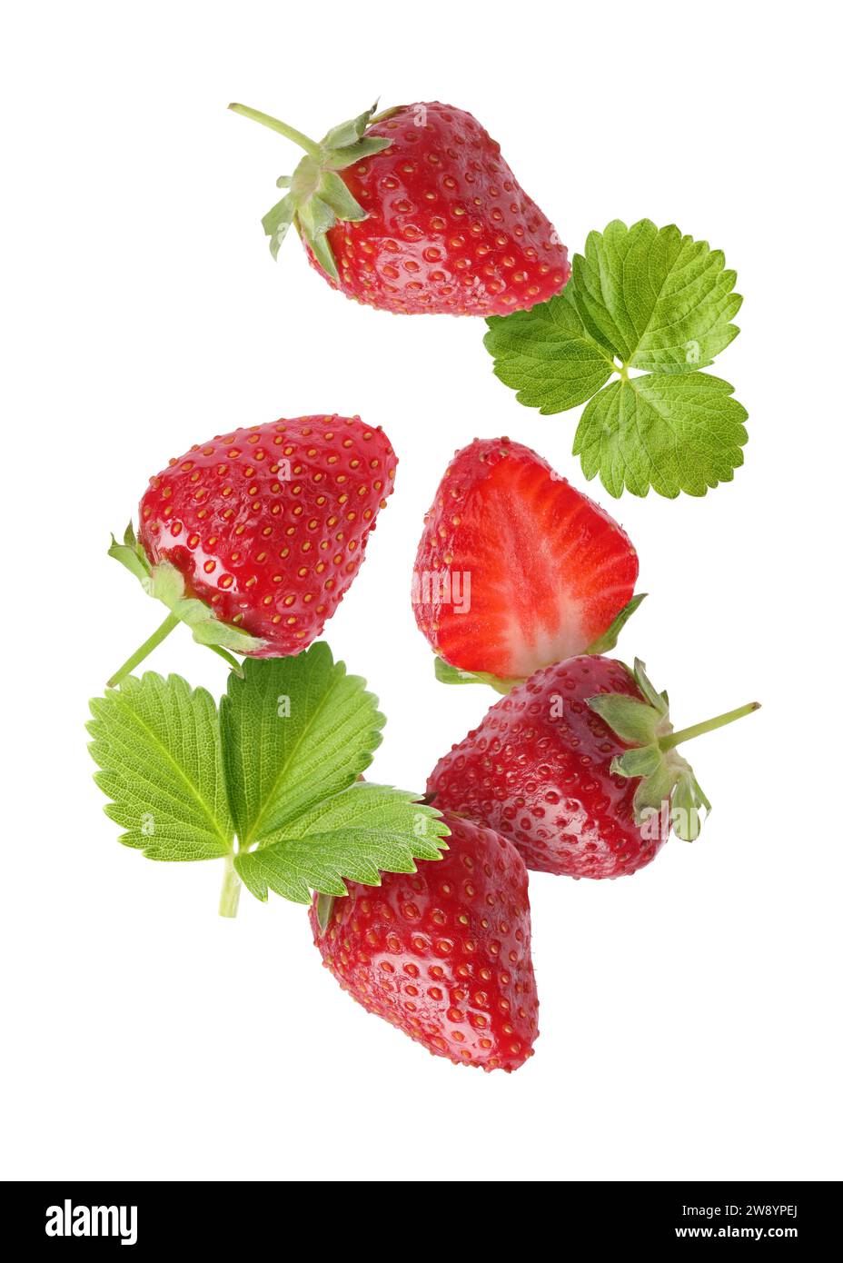Fresh ripe strawberries and green leaves falling on white background ...