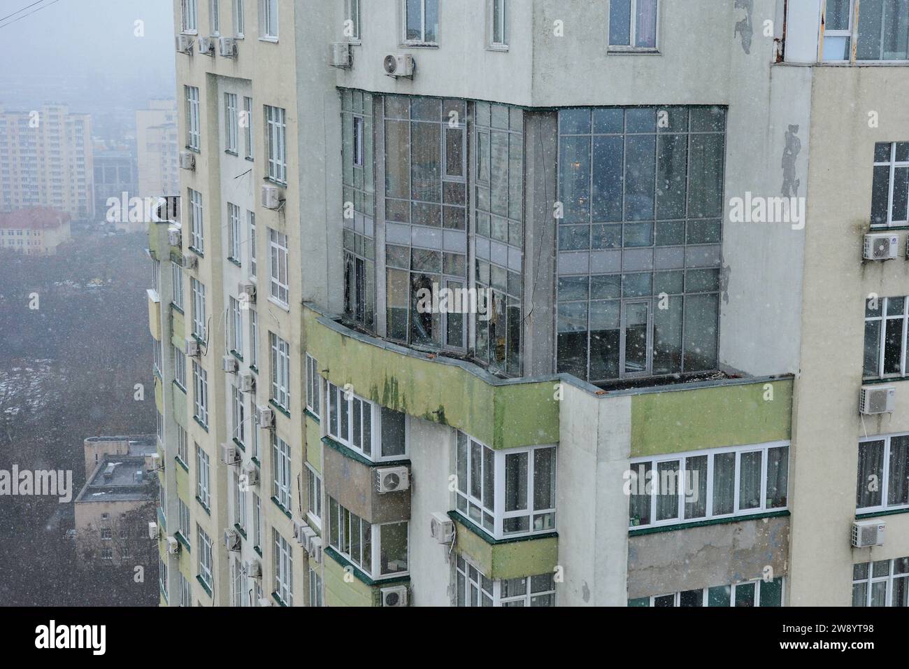 Kyiv, Ukraine. 22nd Dec, 2023. Windows of an apartment in Solomyanskyi district lie broken by a kamikaze drone's fragment explosion. In the early morning, Russia attacked the Ukrainian capital with loitering munitions, known as kamikaze drones, which were intercepted by Ukrainian Air Defense Forces. However, drone fragments resulted in destruction in a few districts of the city. Credit: SOPA Images Limited/Alamy Live News Stock Photo