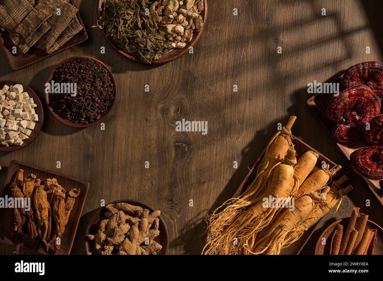Vintage background with wooden trays filled with traditional medicine