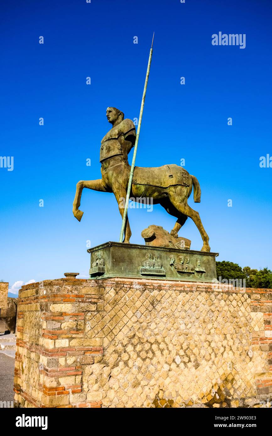 Ruins of the Forum and Centaur Statue, Statua di centauro in the archaeological site of Pompeii, an ancient city destroyed by the eruption of Mount Ve Stock Photo